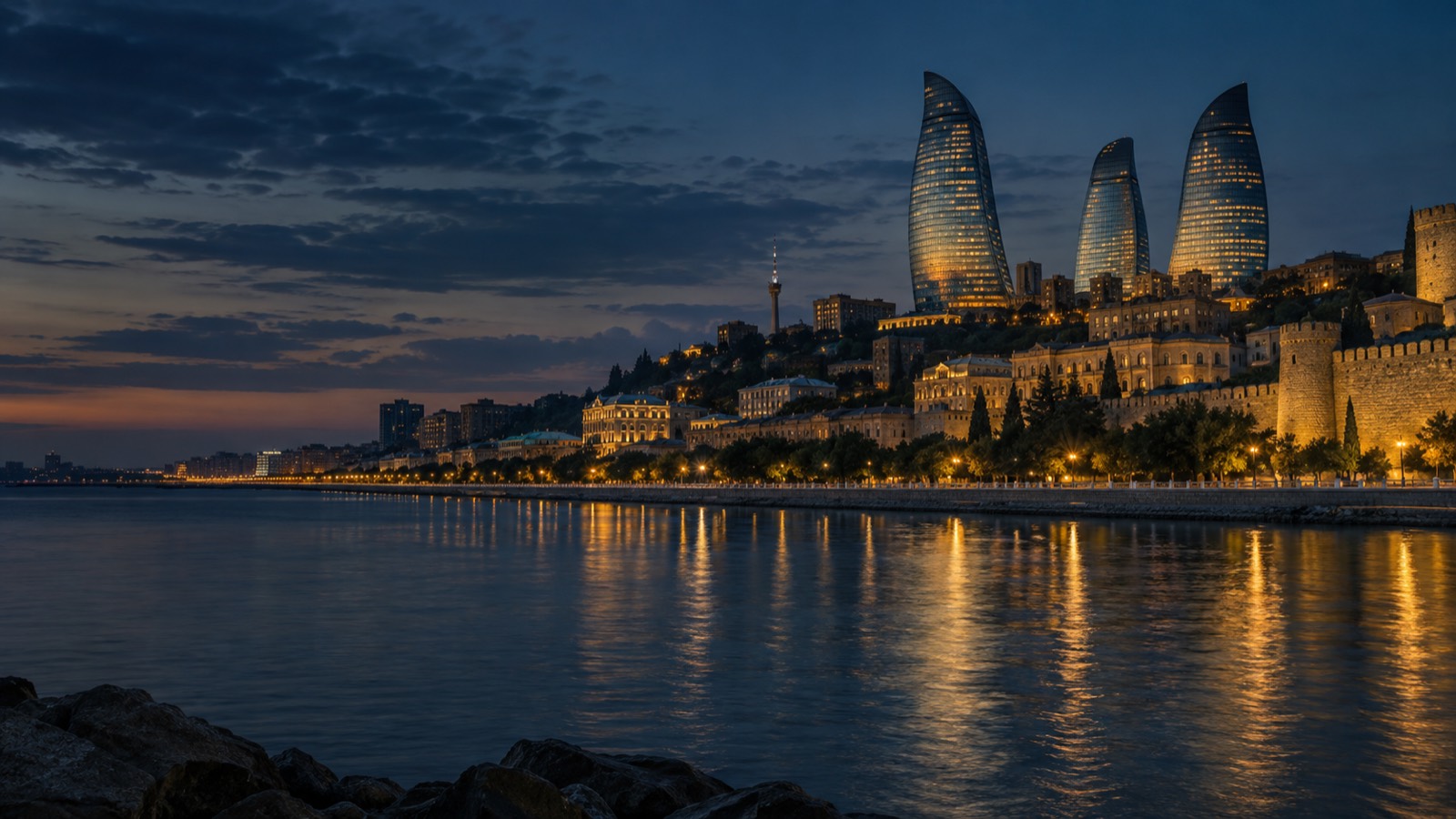 The Flame Towers above Baku's old city at blue hour